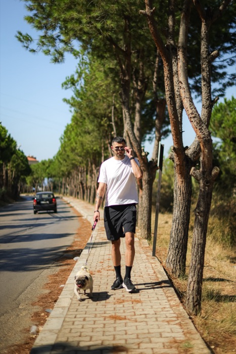 Outdoor portrait with a dog and trees