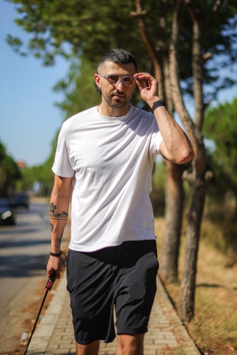 Lifestyle portrait outdoors among trees